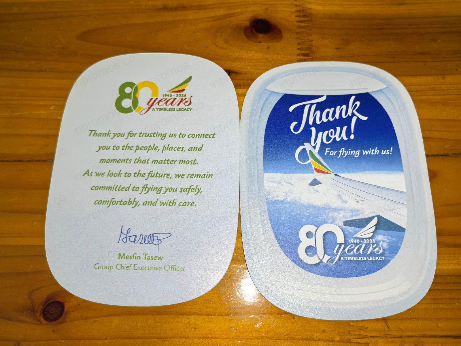 Boarding-pass shaped thank you card with CEO signature — production photo