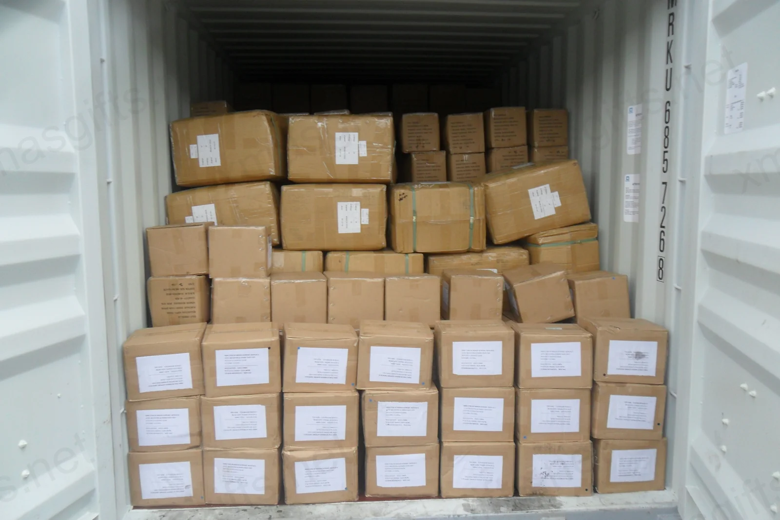 Shipping container loaded with MONUSCO cartons