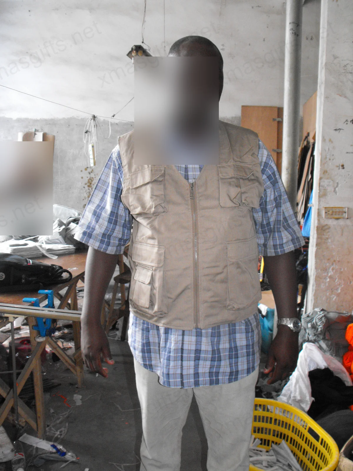 Staff member fitting MONUSCO reporter vest
