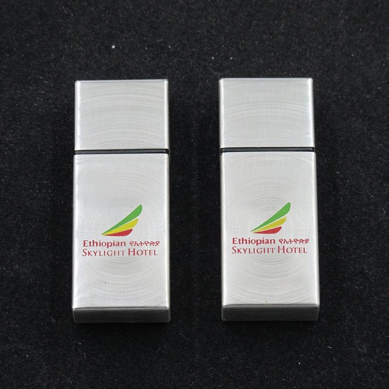 Skylight Hotel custom metal USB drive with laser engraving